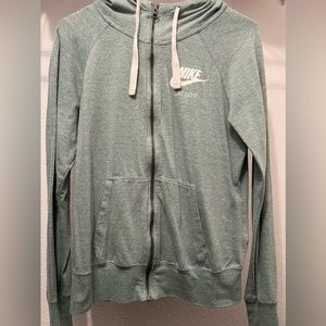 Green Nike zip up hoodie.